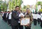 Di Hari Pengayoman ke-81, Wabup Husni Tamrin Terima Penghargaan Mitra Kerja Dari Kemenkumham Untuk Pemkab Pelalawan