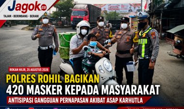 Polres Rohil Bagikan 420 Masker Cegah Dampak Asap Karhutla